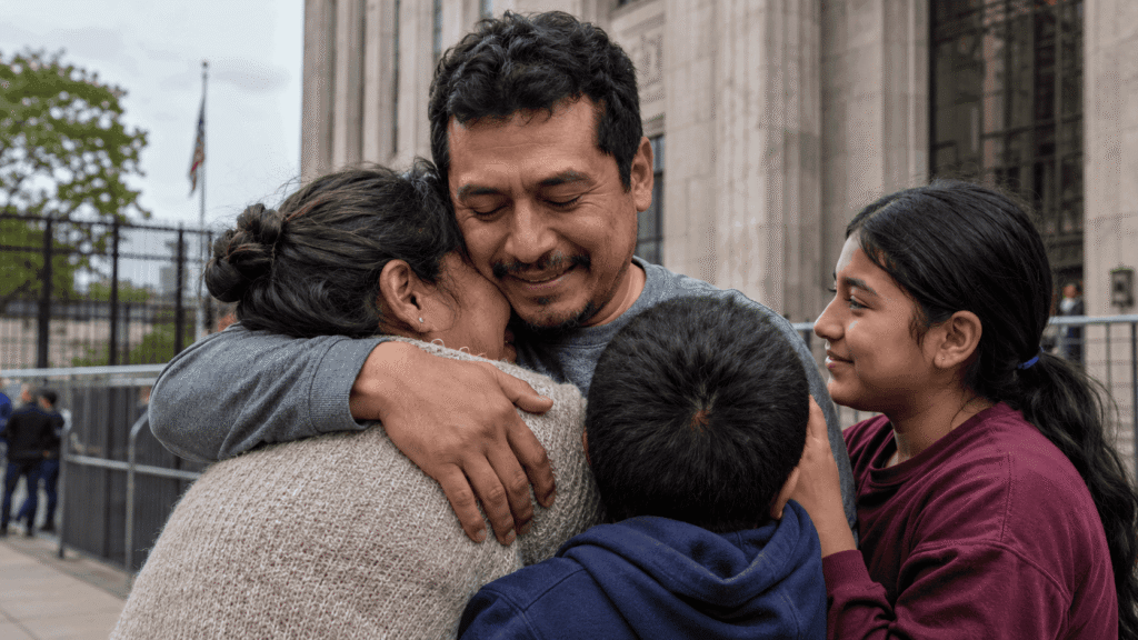 A family reunion representing ICE detention release