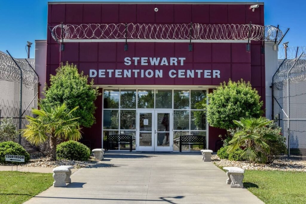 Federal courthouse and detention facility imagery representing a Stewart Detention Center habeas case in Georgia